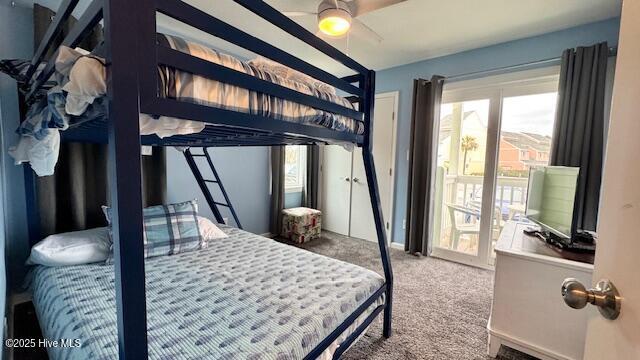 bedroom featuring ceiling fan, carpet flooring, and access to outside