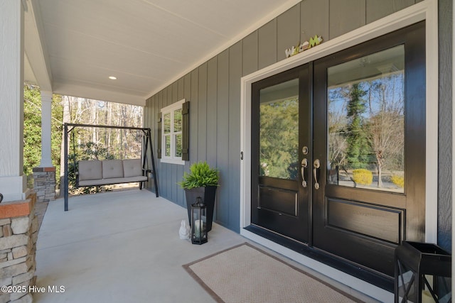 doorway to property with french doors and covered porch