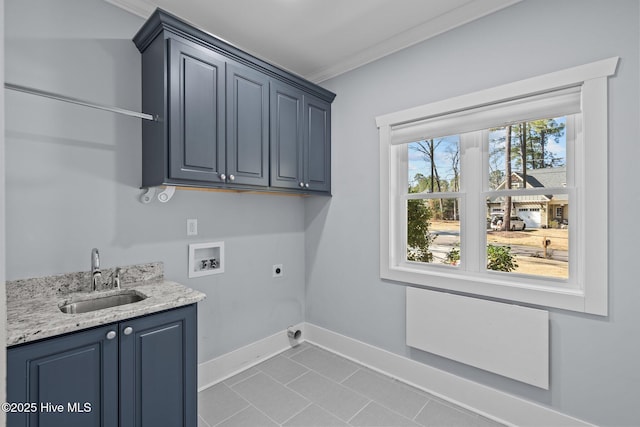 washroom featuring crown molding, washer hookup, cabinet space, electric dryer hookup, and a sink