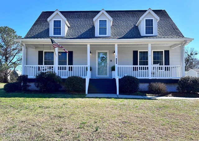 cape cod-style house featuring a porch and a front yard