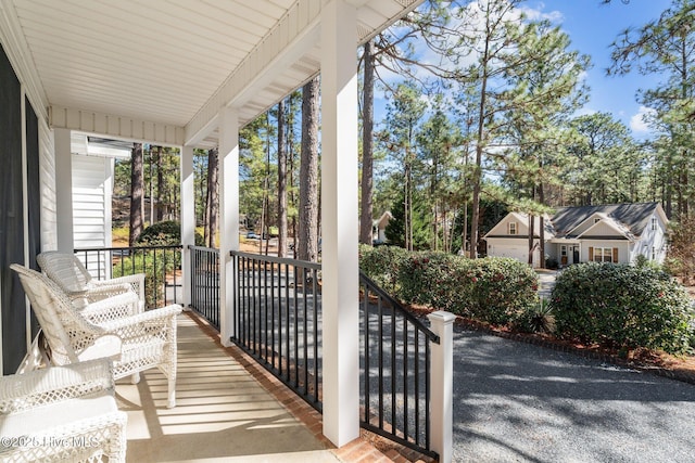 balcony featuring a porch