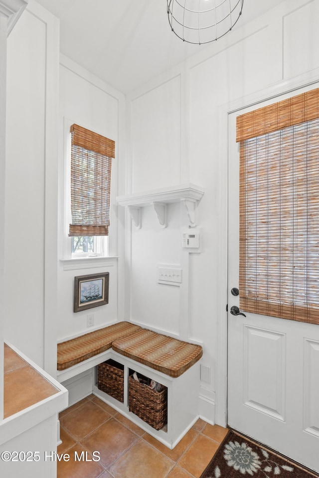 mudroom with light tile patterned floors