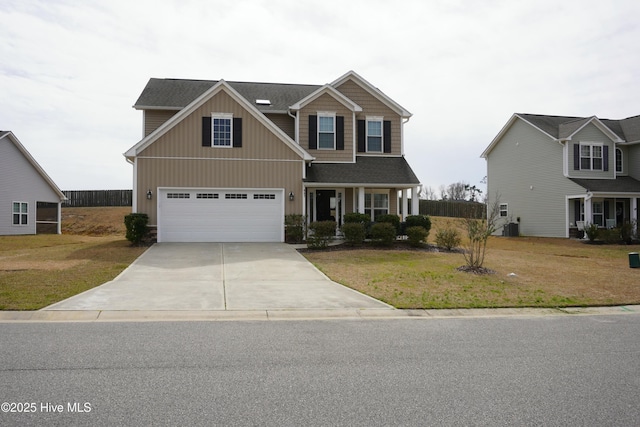 view of front facade featuring driveway, an attached garage, a shingled roof, a front lawn, and central air condition unit