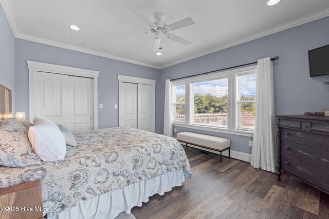 bedroom with crown molding, recessed lighting, multiple closets, and dark wood-type flooring