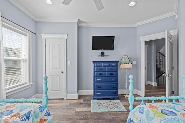 bedroom featuring wood finished floors, baseboards, recessed lighting, ceiling fan, and crown molding