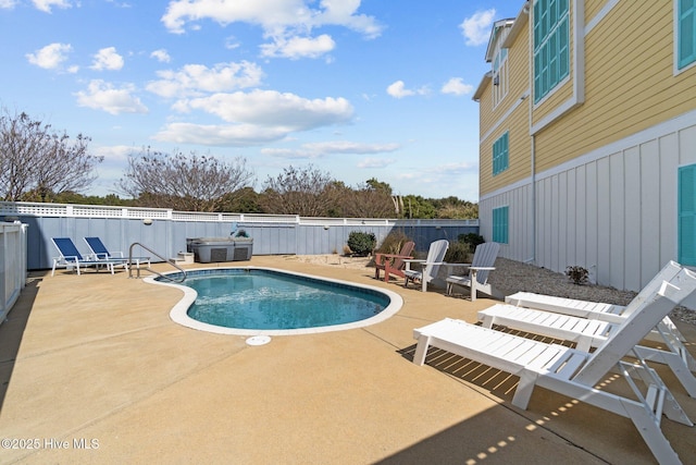 view of pool featuring a patio, a fenced in pool, and fence