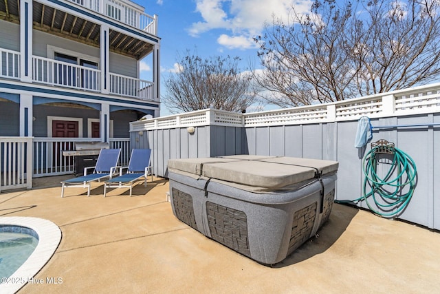 view of patio featuring a hot tub