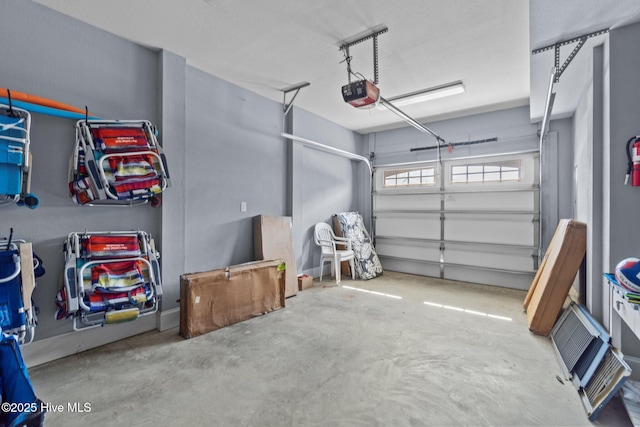 garage featuring a garage door opener