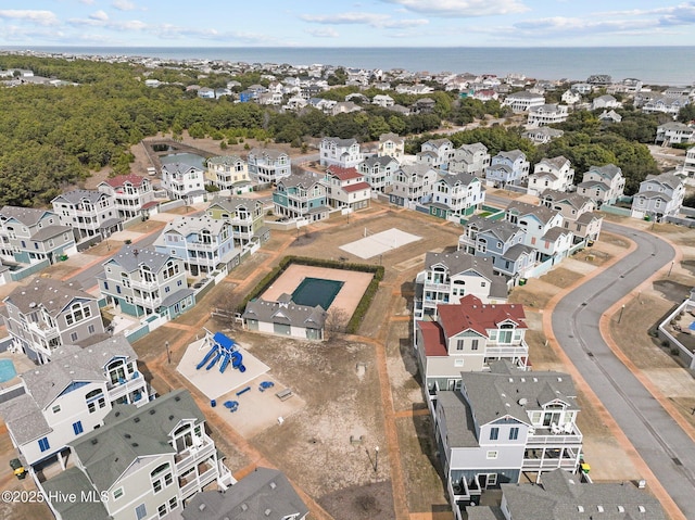 aerial view with a residential view and a water view