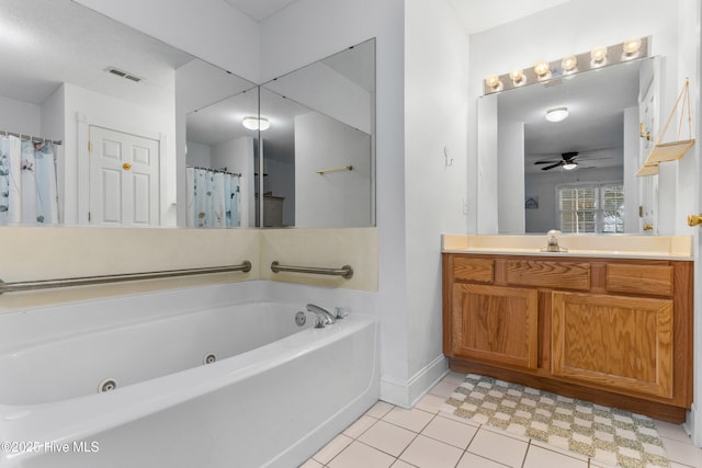 full bath with visible vents, a ceiling fan, vanity, tile patterned flooring, and a tub with jets