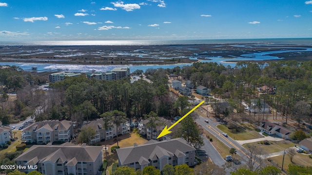 aerial view with a water view and a residential view