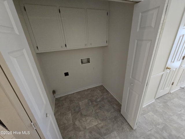 laundry room featuring baseboards, washer hookup, cabinet space, and hookup for an electric dryer