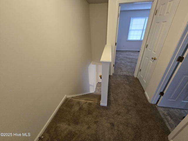 interior space featuring baseboards