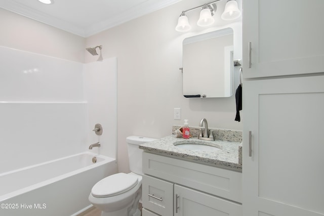 full bathroom with toilet, shower / washtub combination, vanity, and ornamental molding