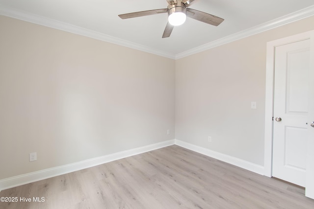 unfurnished room with ceiling fan, light wood-type flooring, baseboards, and ornamental molding