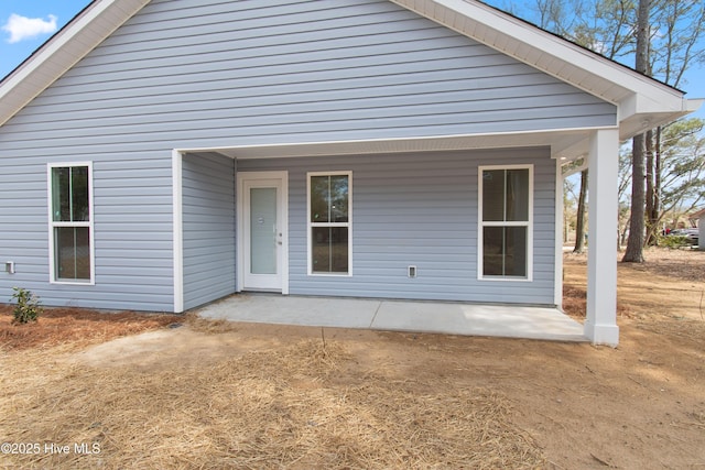 rear view of property with a patio