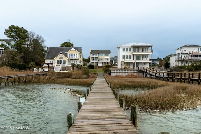 view of dock with a water view