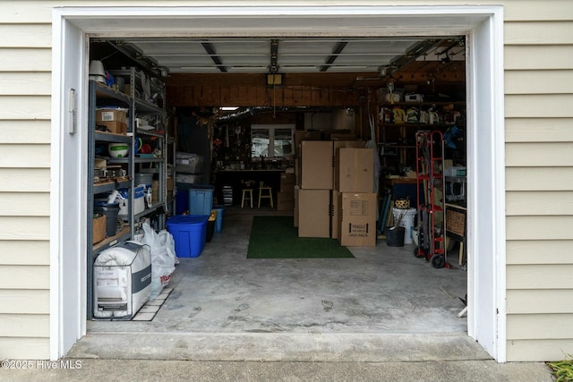 garage with freestanding refrigerator