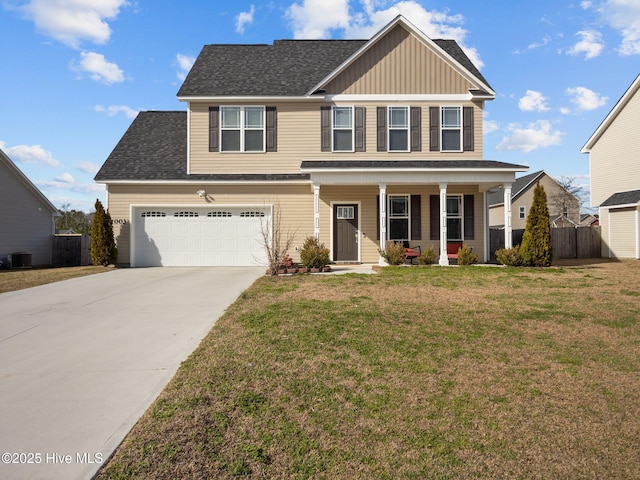 view of front facade featuring driveway, a front lawn, fence, covered porch, and central AC unit