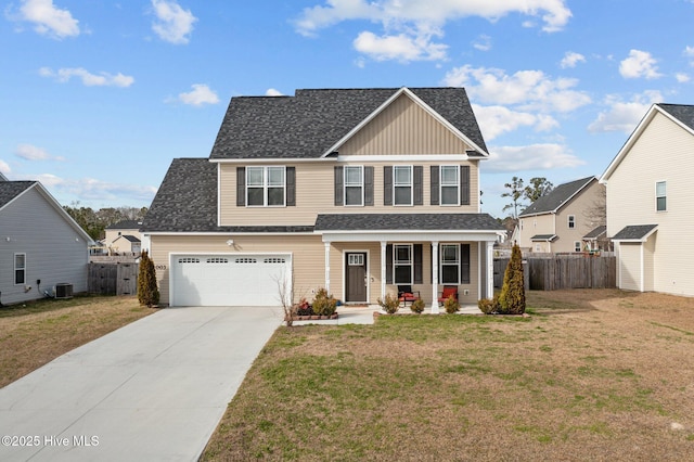 view of front of house with a front yard, cooling unit, fence, a porch, and concrete driveway