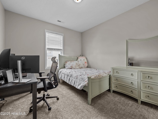 carpeted bedroom with visible vents