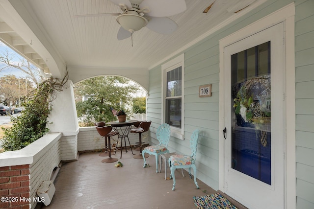 exterior space with a ceiling fan and covered porch