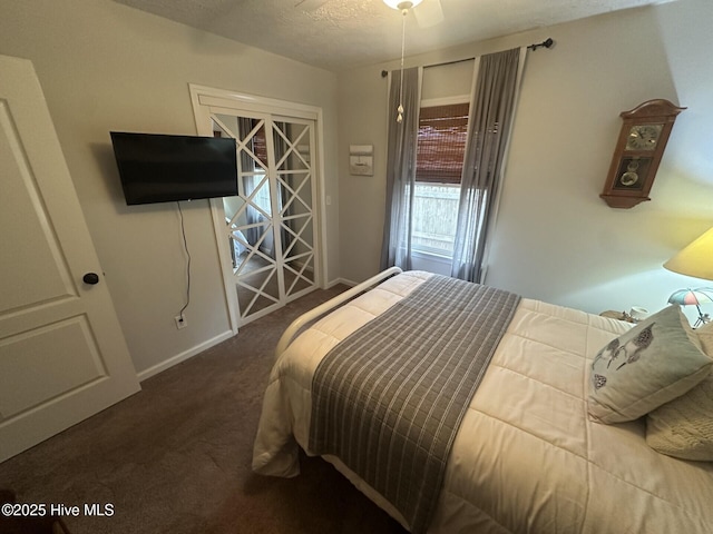 bedroom with carpet flooring and baseboards