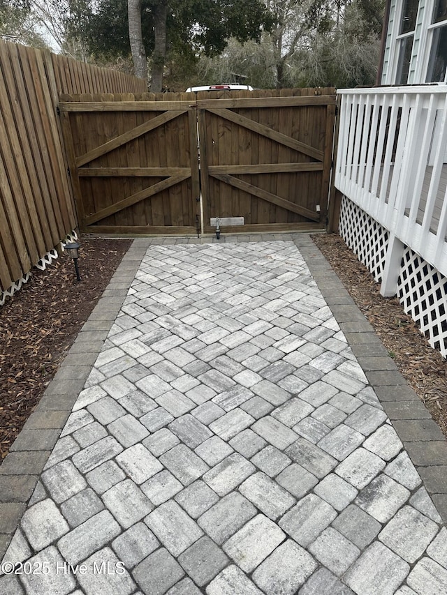 exterior space with a fenced backyard and a patio