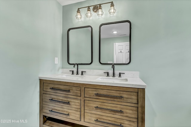 bathroom with double vanity and a sink