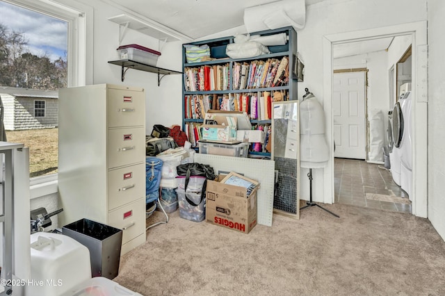 interior space with washer and clothes dryer and plenty of natural light