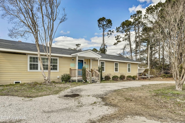 ranch-style house featuring a porch