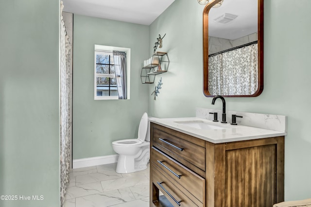 bathroom with visible vents, baseboards, toilet, marble finish floor, and vanity