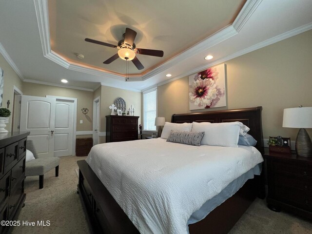 6725 Hemlock Ct, Sims, NC 27880 - carpeted bedroom featuring ceiling fan, a tray ceiling, recessed lighting, and ornamental molding
