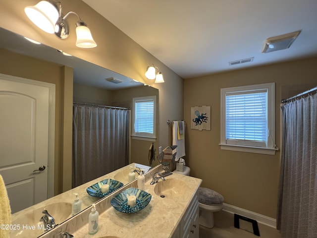 6725 Hemlock Ct, Sims, NC 27880 - full bath featuring curtained shower, visible vents, toilet, vanity, and baseboards