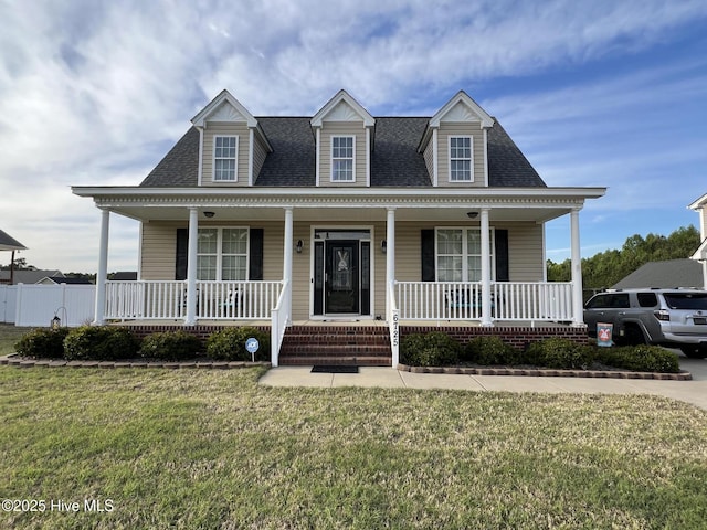 6725 Hemlock Ct, Sims, NC 27880 - view of front of house with a porch, a front lawn, and roof with shingles