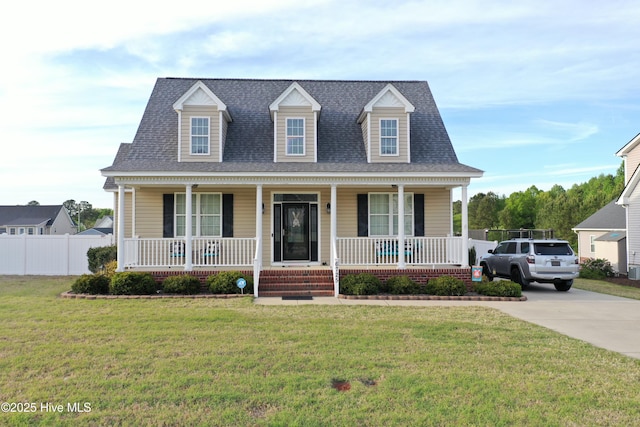 6725 Hemlock Ct, Sims, NC 27880 - cape cod house featuring roof with shingles, fence, a front yard, and covered porch