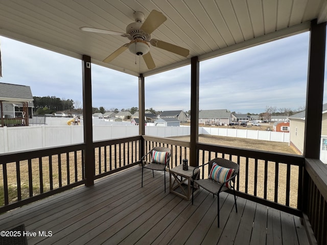 6725 Hemlock Ct, Sims, NC 27880 - wooden terrace featuring a fenced backyard, a residential view, and a ceiling fan