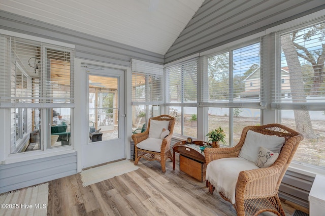 sunroom with vaulted ceiling