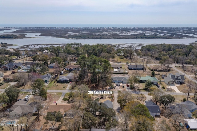 aerial view with a residential view and a water view