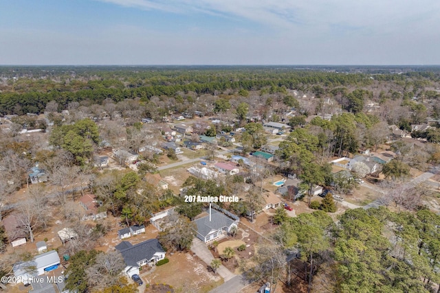 aerial view featuring a view of trees