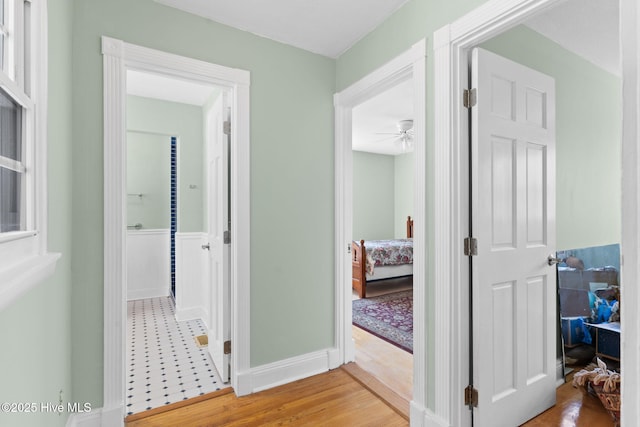 hallway featuring light wood finished floors