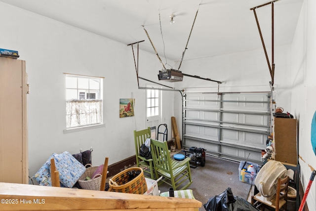 garage featuring a garage door opener