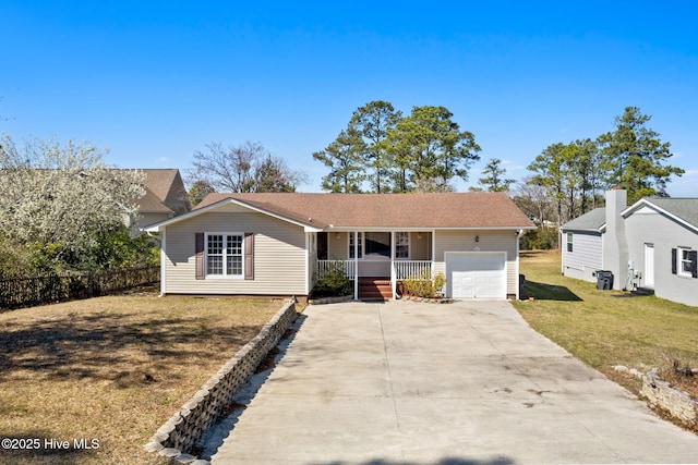 single story home featuring a front lawn, fence, covered porch, driveway, and an attached garage