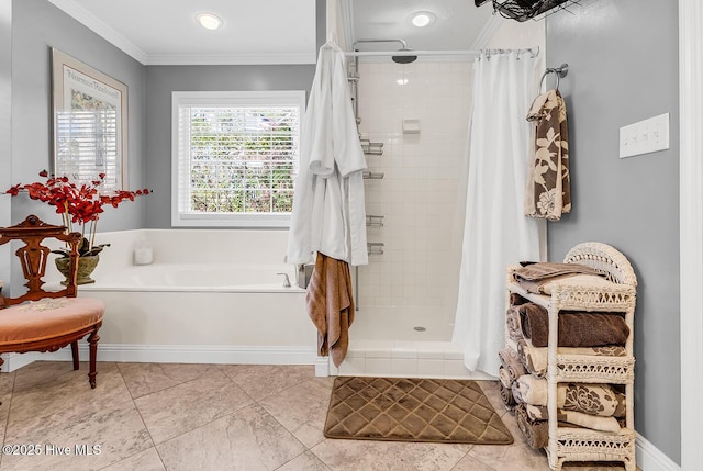 full bathroom featuring crown molding, a garden tub, and a shower stall