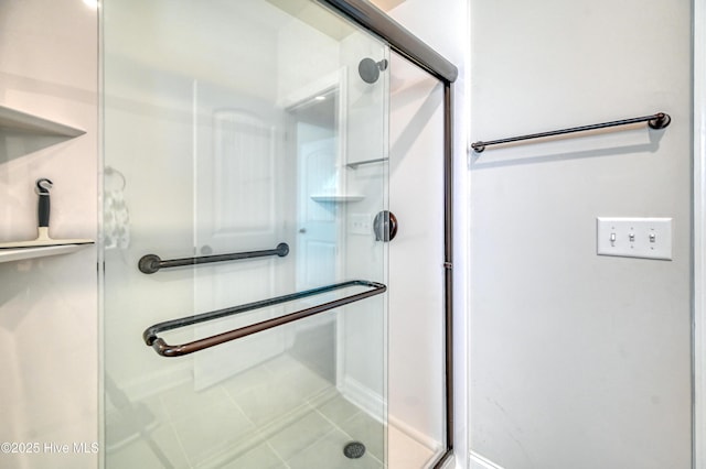 full bathroom featuring a shower stall