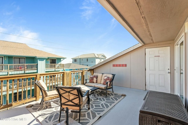 balcony featuring an outdoor living space