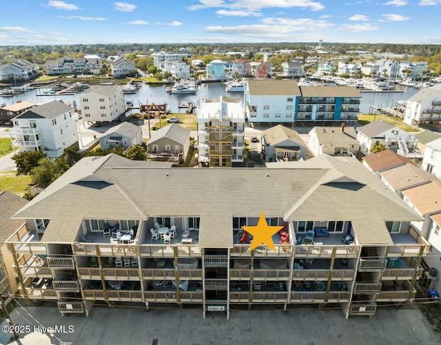 bird's eye view with a water view