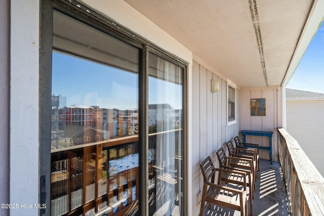 balcony featuring a sunroom