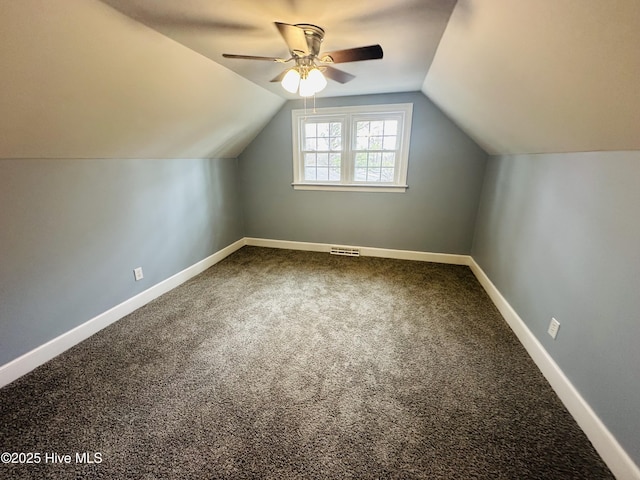 bonus room with visible vents, carpet, baseboards, ceiling fan, and vaulted ceiling