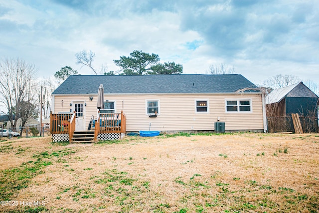 508 Thyme Ct, Jacksonville, NC 28540 - rear view of property featuring central air condition unit, a deck, and fence